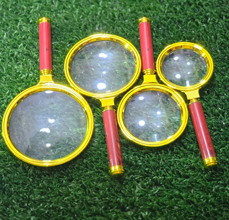 ذره بین دسته دار طلایی سایز 80 میل مدل magnifier
